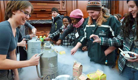 Undergraduate female physics majors enjoy some liquid nitrogen ice cream at the Women in Physics Conference in 2012. (Photo by Michael Marsland)